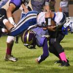 Contributed photo/John Stimpson                                Wolverine Jaden Jones tackles the Braves ball carrier.