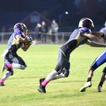 Contributed photo/John Stimpson                                Wolverine Kyson Jackson starts the scoring drive with a touchdown.