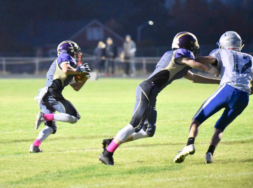 Contributed photo/John Stimpson                                Wolverine Kyson Jackson starts the scoring drive with a touchdown.