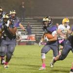 Contributed photo/John Stimpson                                Wolverine Matro Blackmon and others continue to clear the way for Kyson Jackson running up the middle.