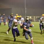 Contributed photo/John StimpsonSwift-footed Kyson Jackson outpaced the Lions with this big yard gaining run.