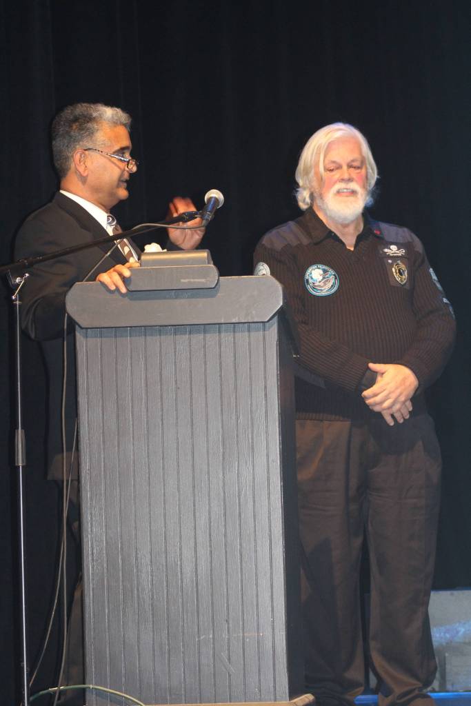 Staff photo/Heather Spaulding. Town of Friday Harbor Mayor Farhad Gahtan welcomes Paul Watson.