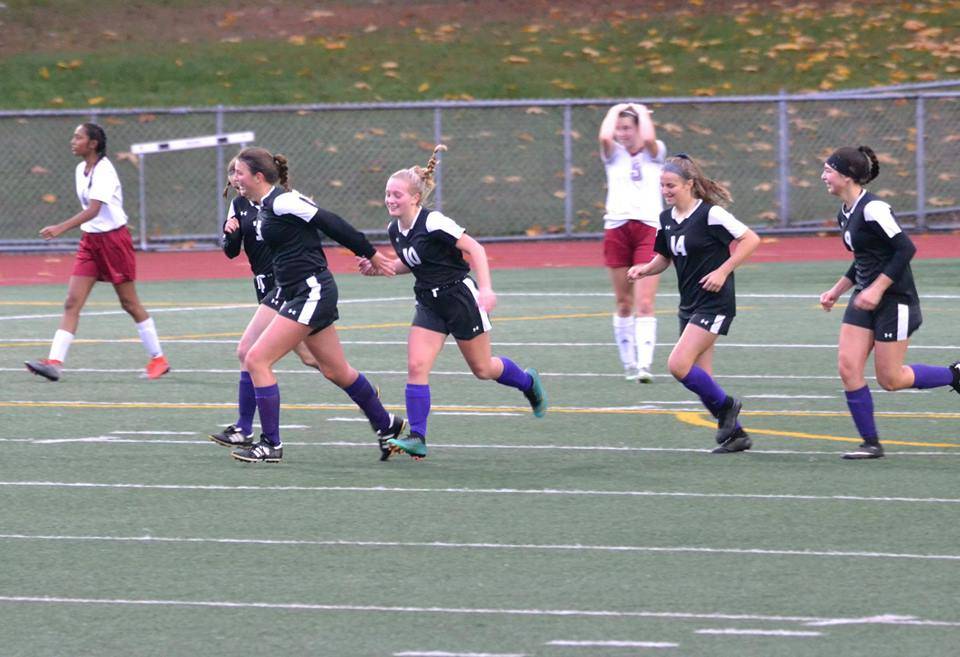 Contributed photo                                Team members celebrate at the Nov. 3 district tournament.