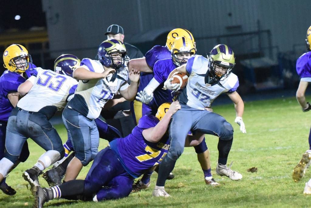 Contributed photo/John Stimpson                                Wolverine Kaden Ritchie fights to gain more yards.