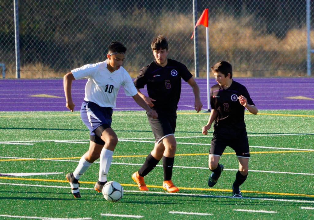Contributed photo/Claudia Mills                                Boys soccer playoff game with Puget Sound Adventist Academy.