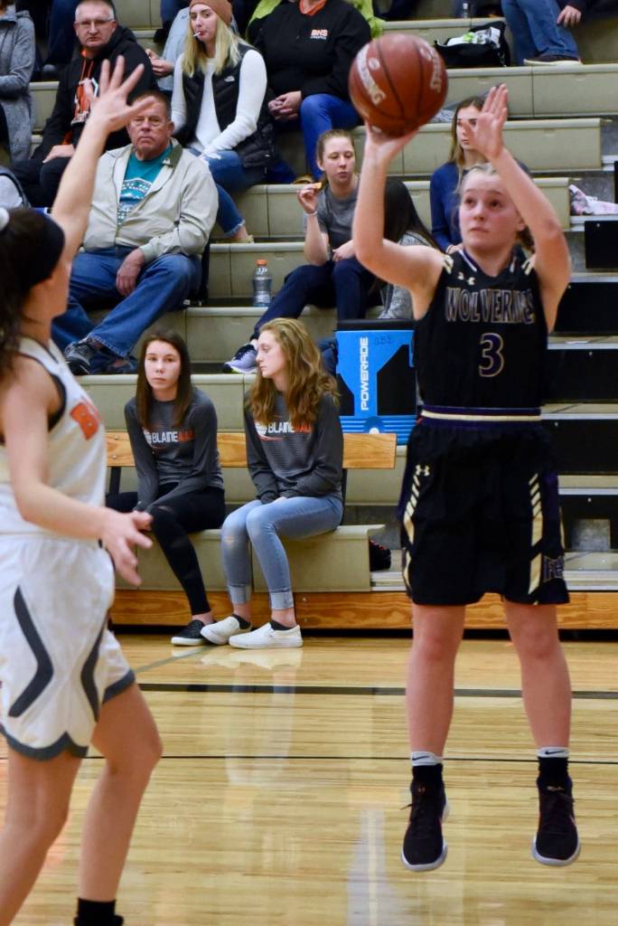 Contributed photo/John Stimpson                                Darcy Ayers takes a jump shot from the side court.