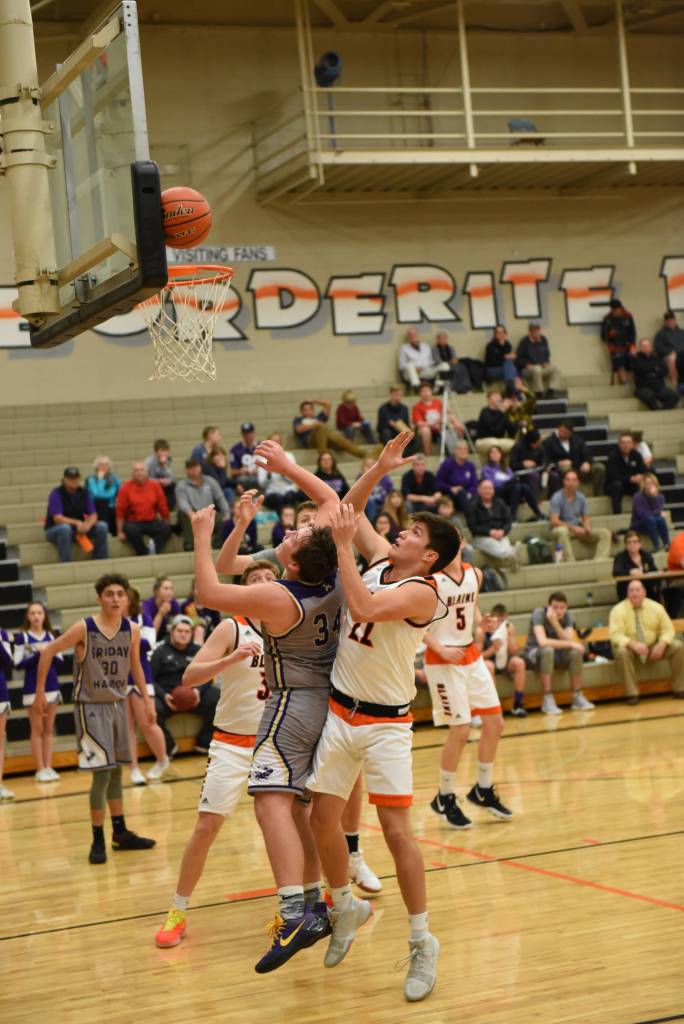 Contributed photo/John Stimpson                                Gavin Mason goes up for the shot amidst many defenders.