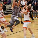 Contributed photo/John Stimpson                                Kyson Jackson soars toward the basket.