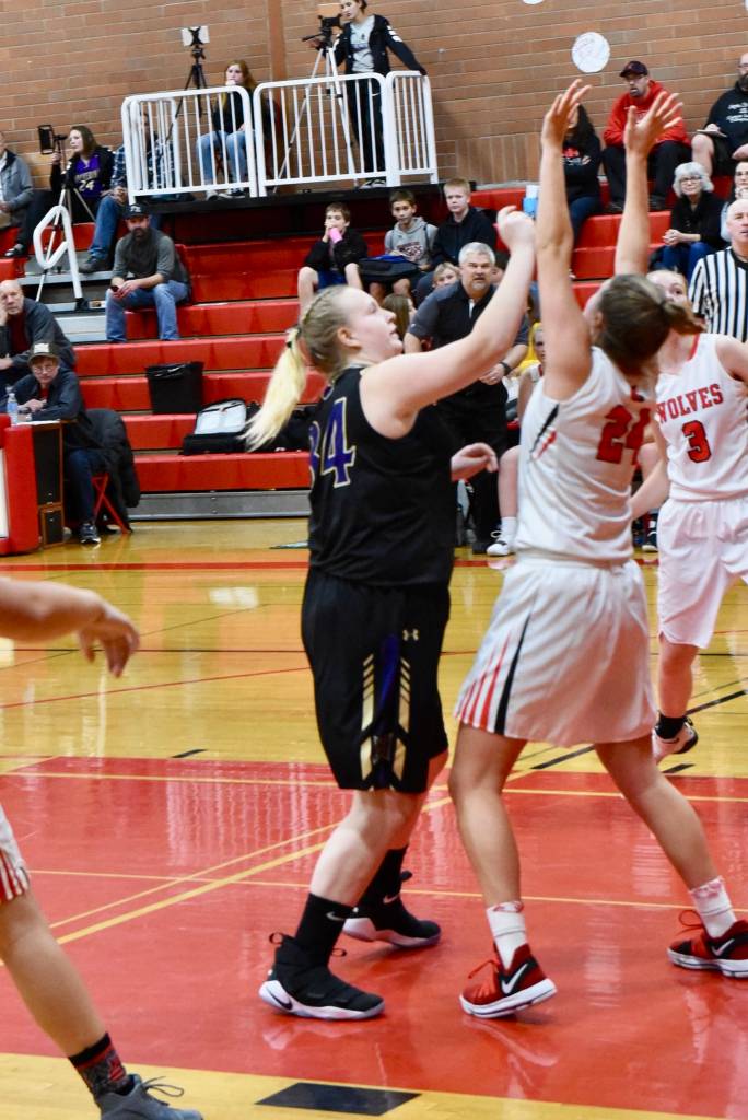 Contributed photo/John Stimpson                                Brittany Muir focuses on grabbing a rebound.