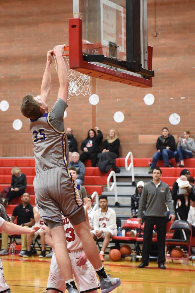 Contributed photo/John Stimpson                                Marshall Clark slam dunks the ball.