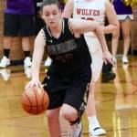 Contributed photo/John Stimpson                                Liz Cruz brings the ball down court.