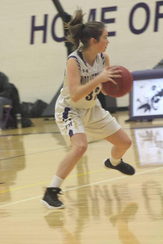Staff photo/Heather Spaulding. Fallon Taylor with the ball.