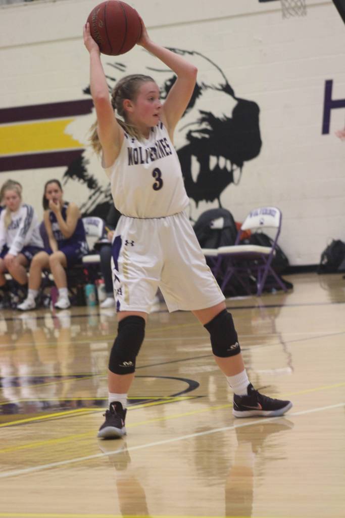 Staff photo/Heather Spaulding. Darcy Ayers passes to her teammates.