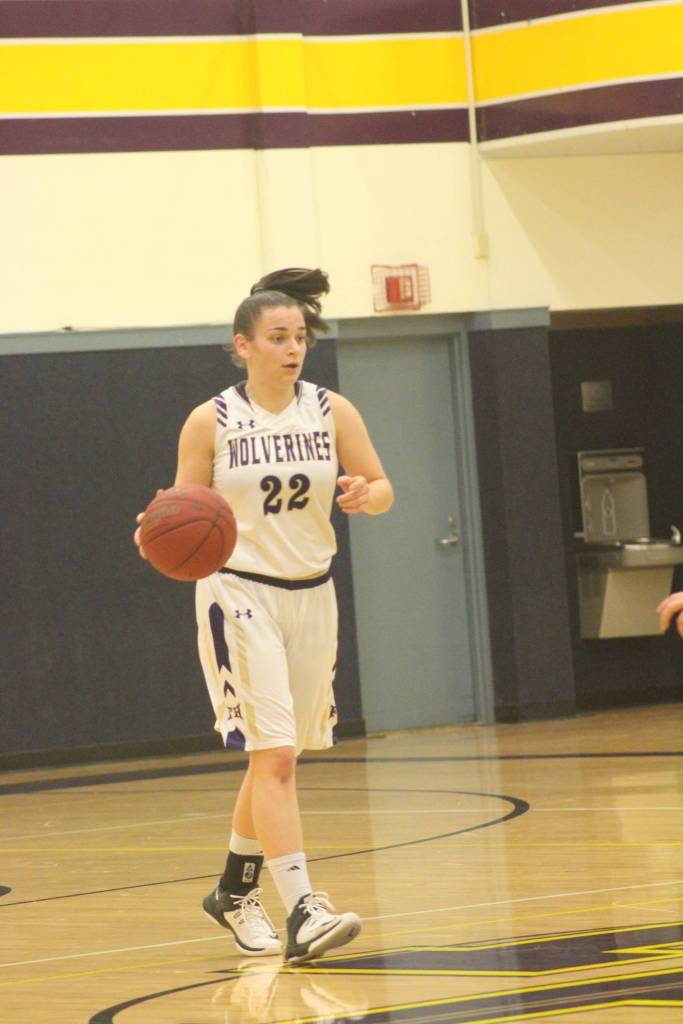Staff photo/Heather Spaulding. Liz Cruz makes her way down court.