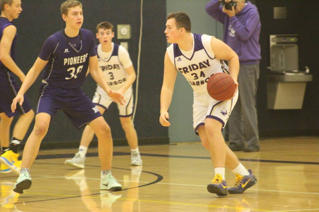 Staff photo/Heather Spaulding. Gavin Mason works his way to make a shot.