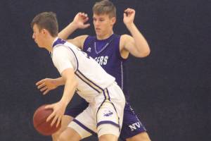 Wolverines basketball teams fall to the Pioneers