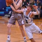 Contributed photo/John Stimpson                                Peter Kulseth grabs the rebound.