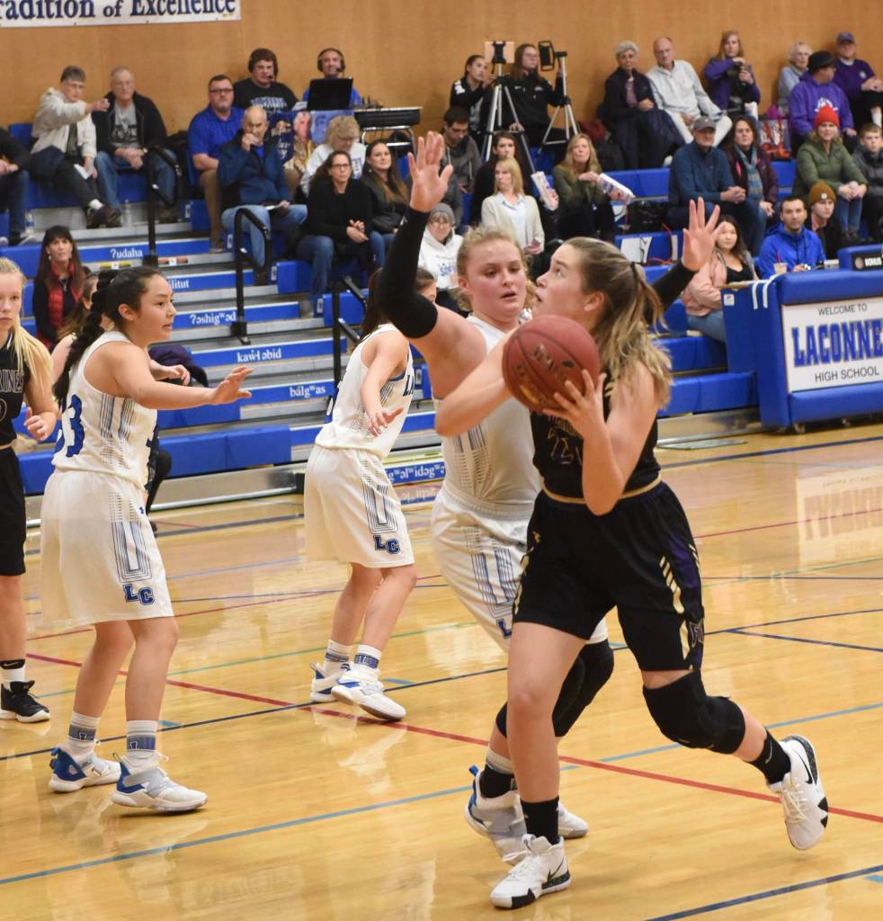 Contributed photo/John Stimpson                                Bailee Lambright drives for a 2-point shot.