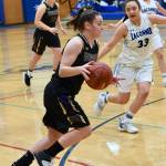 Contributed photo/John Stimpson                                Liz Cruz races toward the basket.