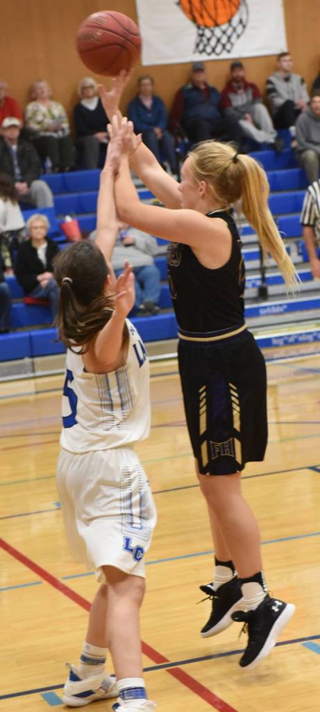 Contributed photo/John Stimpson                                Tori Polda shoots for 2 points.