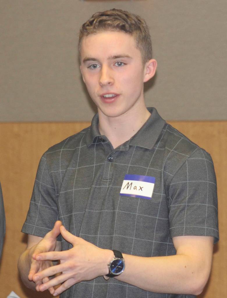 Staff photo/Hayley Day                                Max Mattox presents at the local Rotary club on Dec. 19.