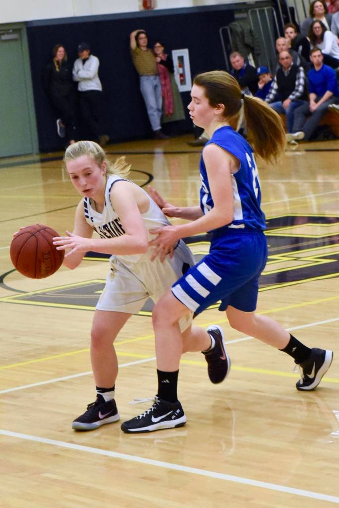 Contributed photo/John Stimpson                                Darcy Ayers drives toward the basket.