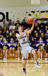 Boys, girls Wolverines basketball defeat Vikings on home turf