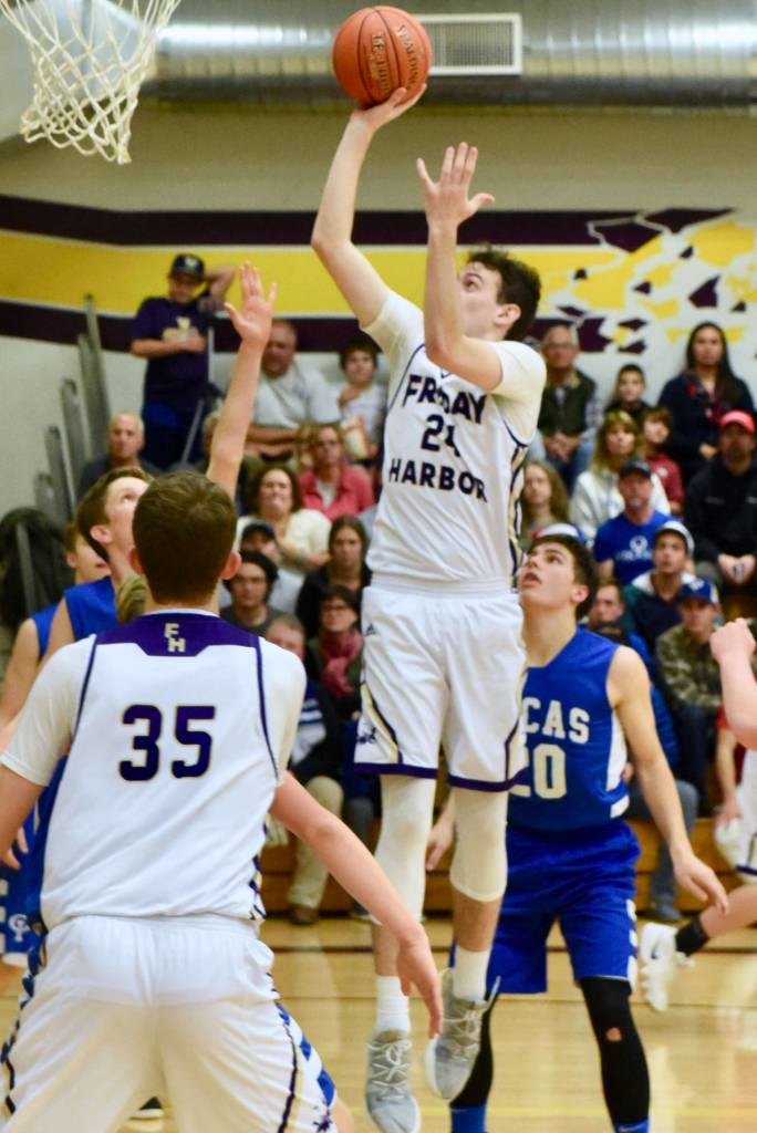 Contributed photo/John Stimpson                                Kyle Mapstead continues the scoring drive with 2 more points.