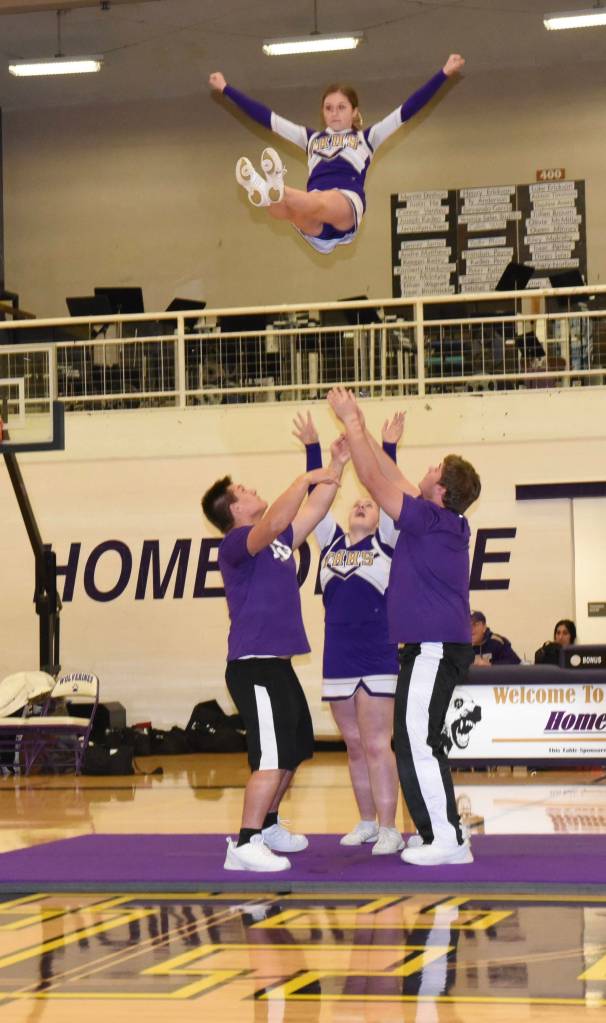 Contributed photo/John Stimpson                                The Wolverines cheerleaders lift teammates for a special halftime routine.