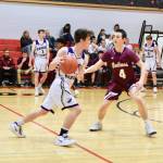 Contributed photo/John Stimpson                                Ethan Germain starts his drive toward the basket.