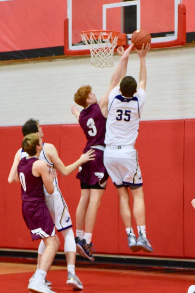Contributed photo/John Stimpson                                Marshall Clark lays up a 2-point shot.