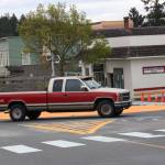 Staff photo/Hayley Day                                A driver makes his way through Friday Harbors painted roundabout after it first opened in May.