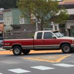 Staff photo/Hayley Day                                A driver makes his way through Friday Harbors painted roundabout after it first opened in May.
