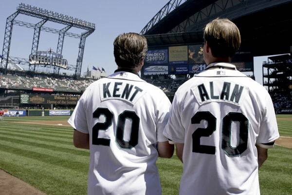 Contributed photo. Popular radio hosts Kent and Alan thow the ball before a Seattle Mariners game.