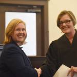 Staff photo/Tate Thomson                                Carolyn Jewett (left) being sworn-in by the Honorable Judge Kathryn C. Loring (right) on Jan. 11.