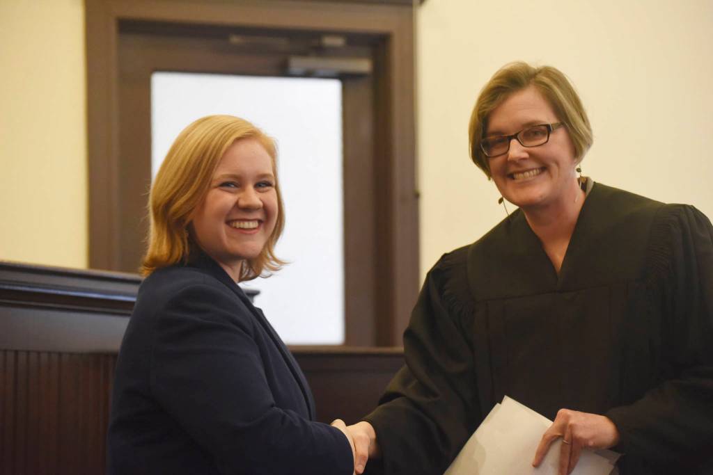 Staff photo/Tate Thomson                                Carolyn Jewett (left) being sworn-in by the Honorable Judge Kathryn C. Loring (right) on Jan. 11.