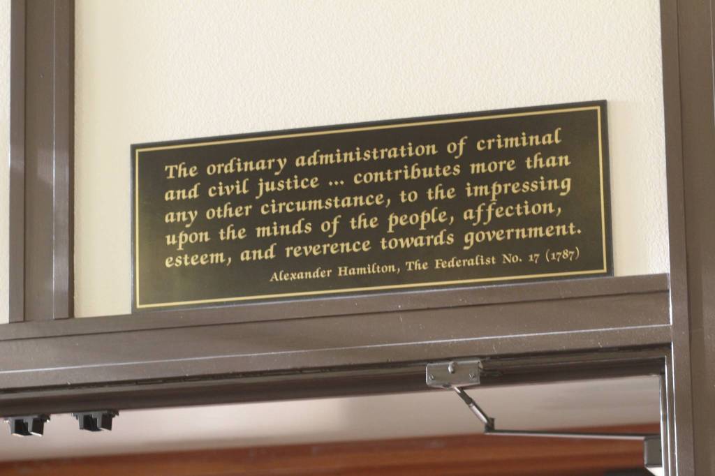 Staff photo/Hayley Day                                A quote from the Federalist Papers hangs in Judge Andrews court.