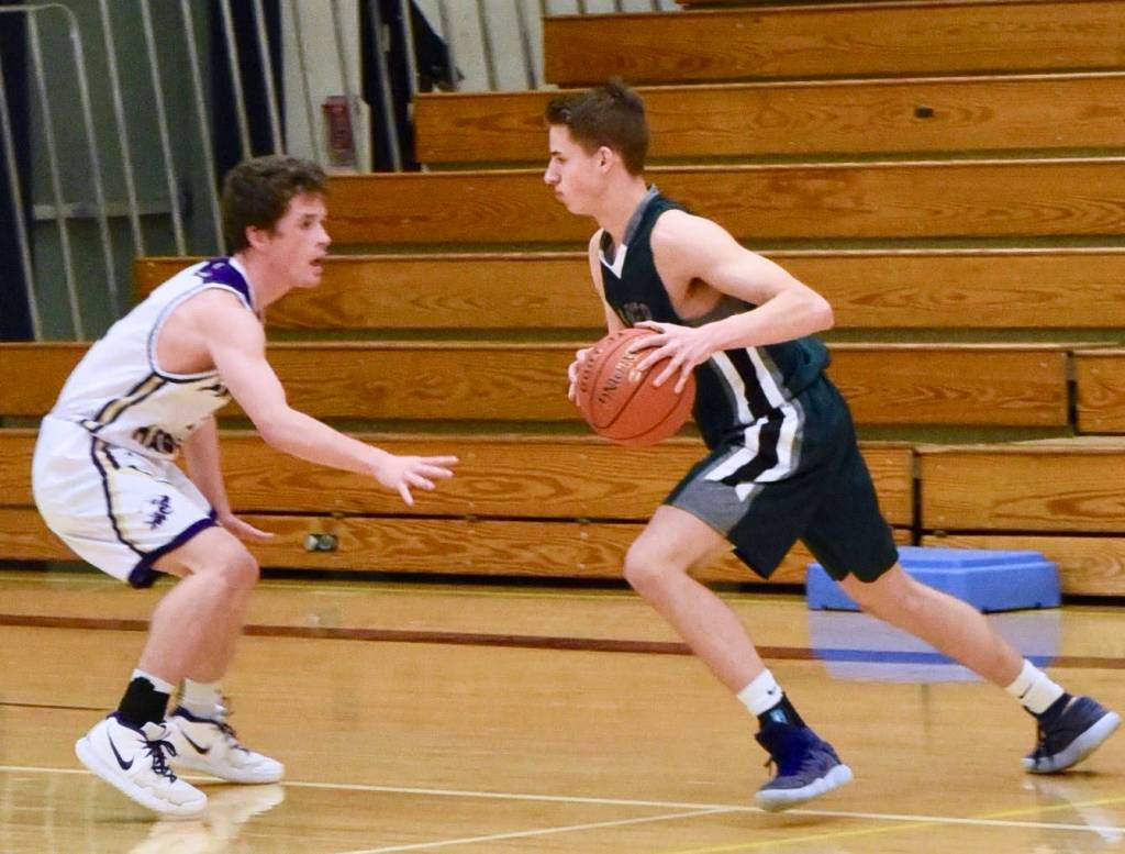 Contributed photo/John Stimpson                                Ethan Germain applies defensive pressure on Jan. 5.
