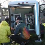 Staff photo/Hayley Day                                Will Wallace, with the state department of ecology, trains another staff member Jenny Li to maintain the temporary monitor.