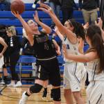 Contributed photo/ John Stimpson                                Ava Hoffman does a fadeaway shot to the basket.