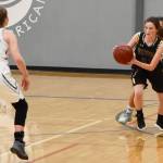 Contributed photo/John Stimpson                                Fallon Taylor brings the ball up court.