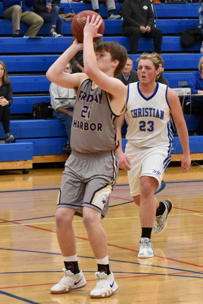 Contributed photo/ John Stimpson                                Chase Wilson shoots from the top of the key for two points.