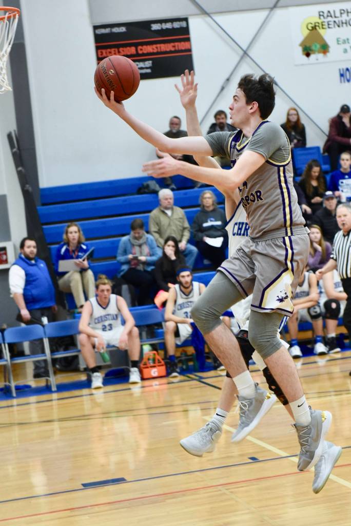 Contributed photo/ John Stimpson                                Kyle Mapstead sails toward the basket.