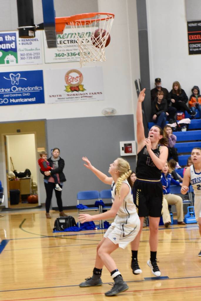 Contributed photo/ John Stimpson                                Leah Black with a six-foot jumper and two points.