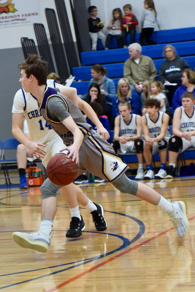 Contributed photo/ John Stimpson                                Lucas Chevalier drives toward the basket.