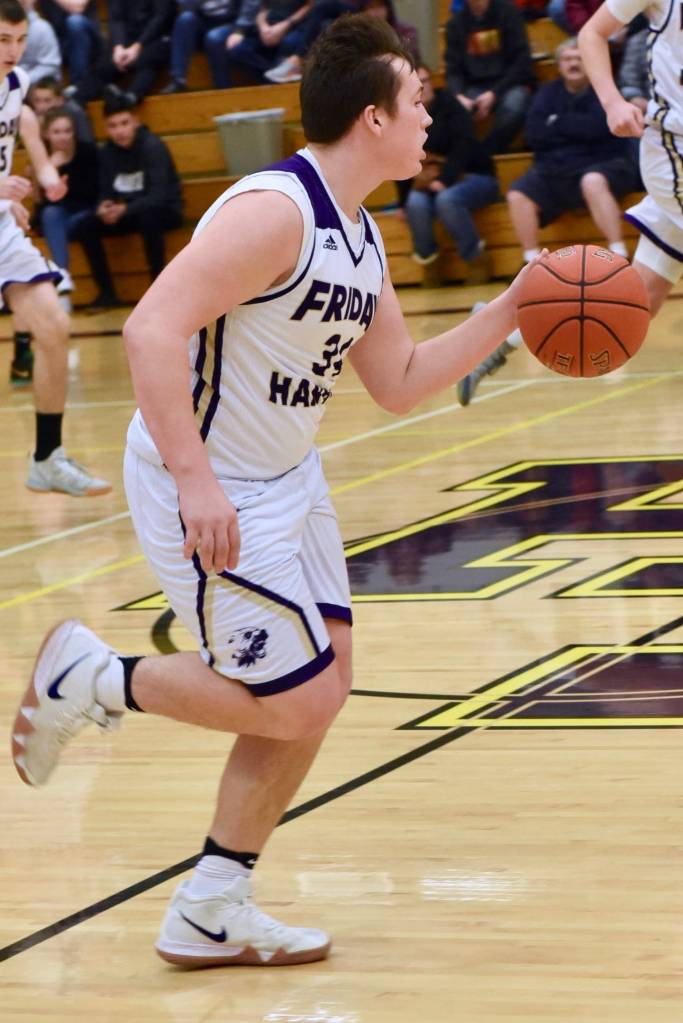 Contributed photo/John Stimpson                                Gavin Mason brings the ball up court.