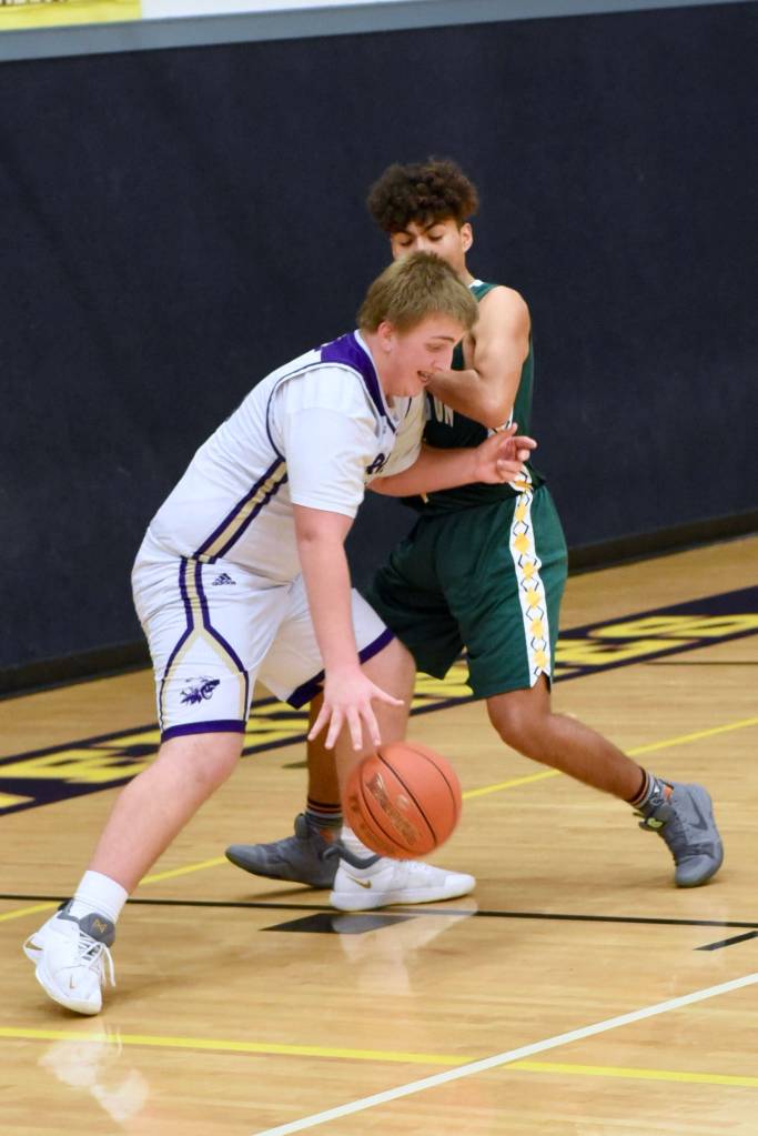 Contributed photo/John Stimpson                                Teagan August drives toward the basket.