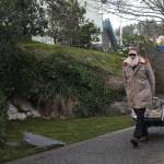 Staff photo/Hayley Day                                A man walks past the ports filled fountain on Jan. 15.
