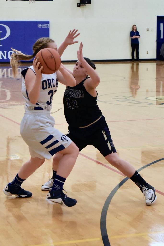 Liz Cruz applies tough defense.