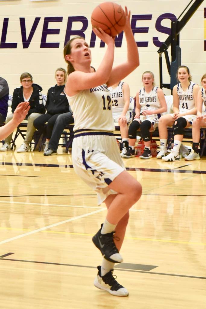 Leah Black lays up a shot for two points.